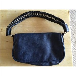 Small navy handbag by shiraleah